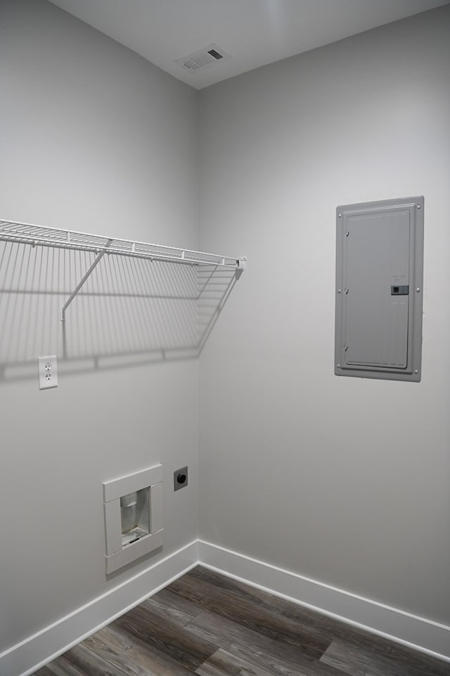 washroom featuring hookup for an electric dryer and dark hardwood / wood-style floors