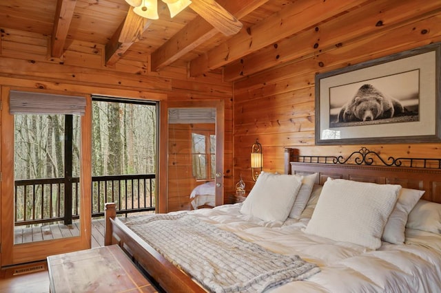 bedroom with wooden walls, visible vents, beamed ceiling, wood ceiling, and access to outside