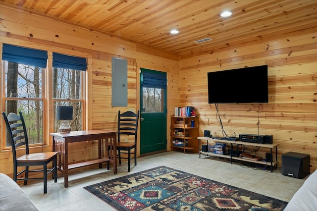 interior space featuring electric panel, recessed lighting, wood walls, and wood ceiling