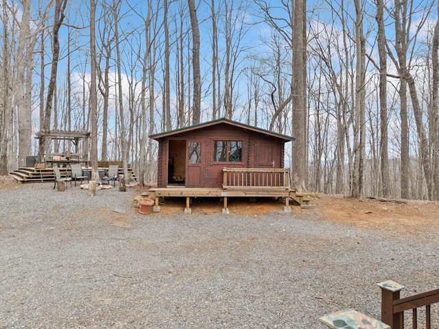 view of front of property with a deck