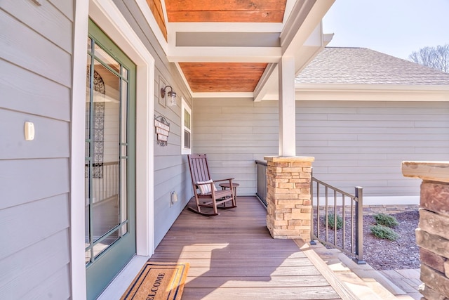 wooden terrace featuring a porch