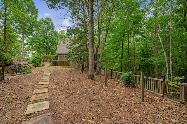 view of yard with fence