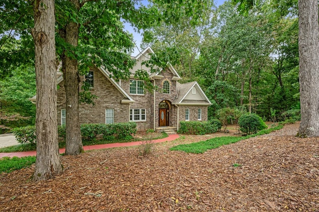 traditional home with brick siding