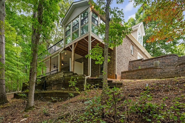 view of front of property with ceiling fan