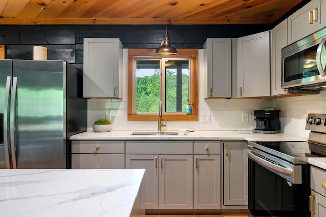 149 Happy Hollow Ln, Mineral Bluff, GA 30559 - kitchen featuring stainless steel appliances, wooden ceiling, a sink, tasteful backsplash, and light stone counters