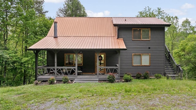 149 Happy Hollow Ln, Mineral Bluff, GA 30559 - view of front of home featuring metal roof, stairs, and covered porch