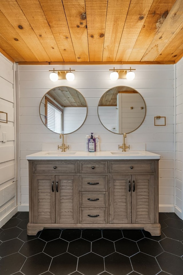 149 Happy Hollow Ln, Mineral Bluff, GA 30559 - full bathroom with double vanity, wooden ceiling, wood walls, and baseboards
