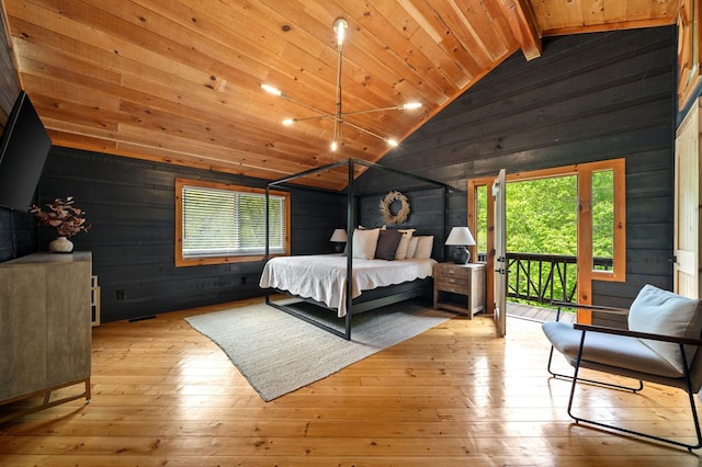 149 Happy Hollow Ln, Mineral Bluff, GA 30559 - bedroom featuring wood walls, access to outside, wooden ceiling, and hardwood / wood-style flooring