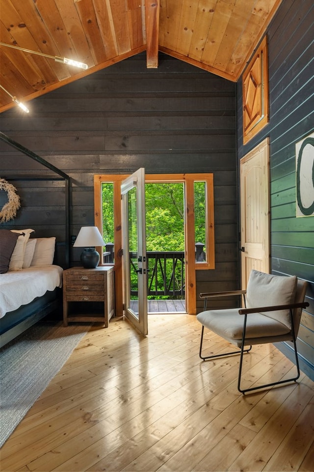 149 Happy Hollow Ln, Mineral Bluff, GA 30559 - bedroom featuring wooden walls, access to outside, wooden ceiling, and hardwood / wood-style floors