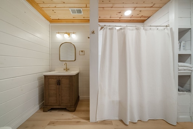 149 Happy Hollow Ln, Mineral Bluff, GA 30559 - full bath with wood ceiling, vanity, wood finished floors, and a shower with curtain