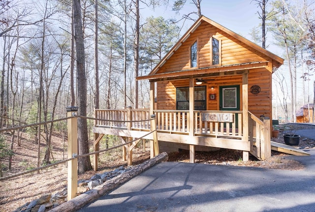 view of front of home with faux log siding
