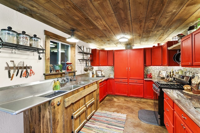 kitchen with stainless steel range with gas cooktop, sink, backsplash, stainless steel counters, and wooden ceiling