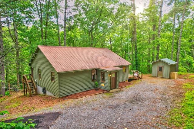 view of front of home with a storage unit