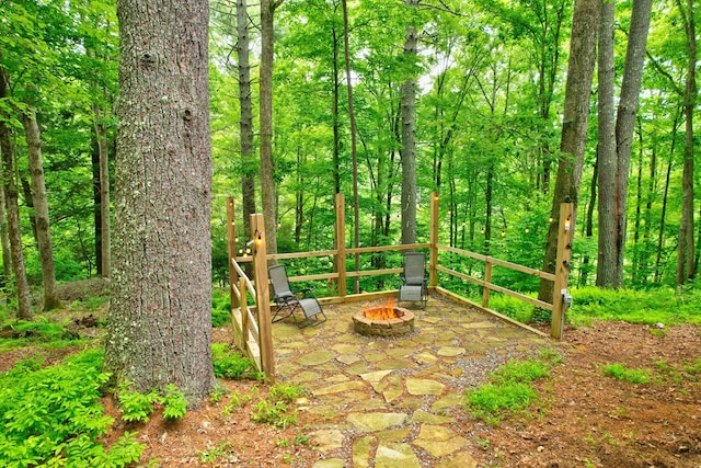 view of patio / terrace featuring a fire pit