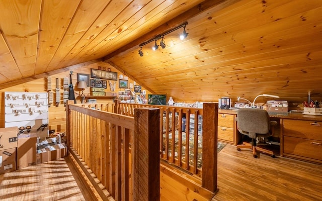 office featuring wood ceiling, wood finished floors, rail lighting, and vaulted ceiling