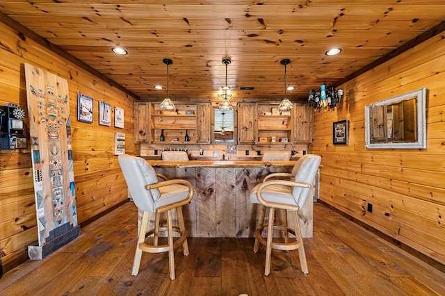 bar featuring wooden ceiling, wooden walls, dark wood finished floors, and recessed lighting