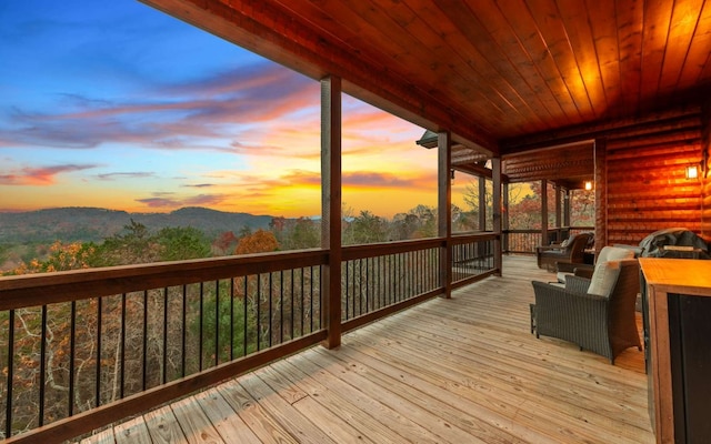 wooden terrace with a mountain view