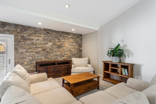living room featuring recessed lighting, ornamental molding, and a fireplace