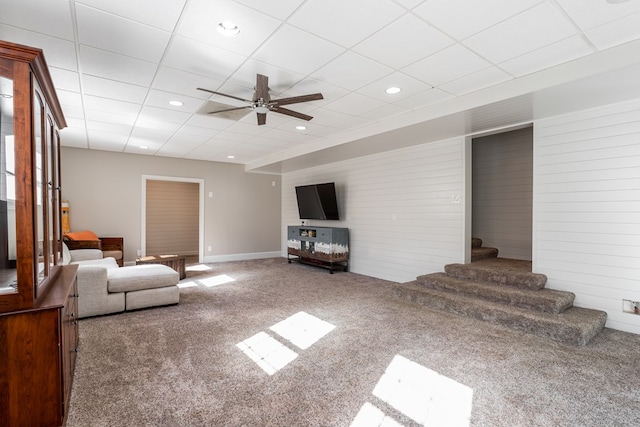 living room with baseboards, recessed lighting, carpet, a ceiling fan, and stairs