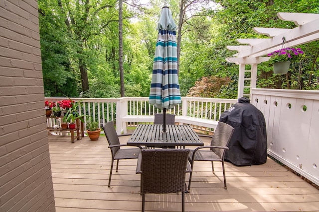 wooden deck with outdoor dining area