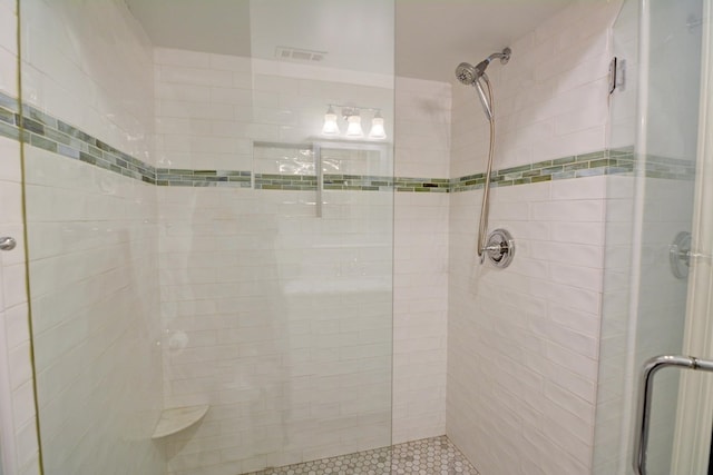 full bath featuring visible vents and a stall shower