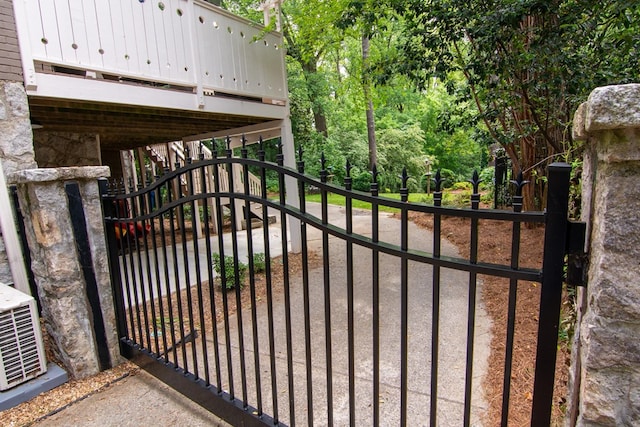 view of gate featuring stairs