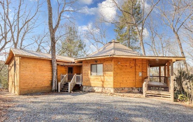 view of front of house featuring metal roof