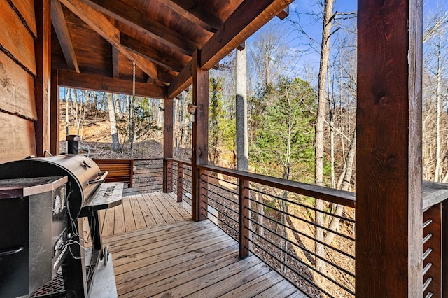 wooden deck with grilling area