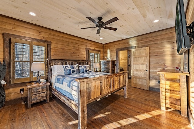 bedroom featuring ceiling fan, hardwood / wood-style floors, and wood ceiling