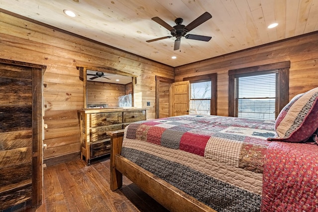 bedroom with ceiling fan, wooden ceiling, and hardwood / wood-style flooring