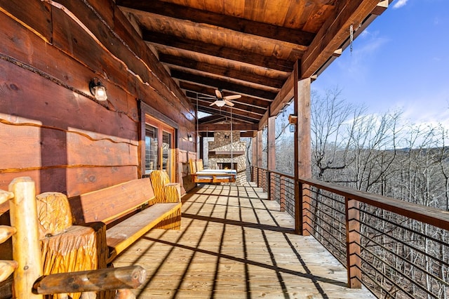 balcony featuring ceiling fan