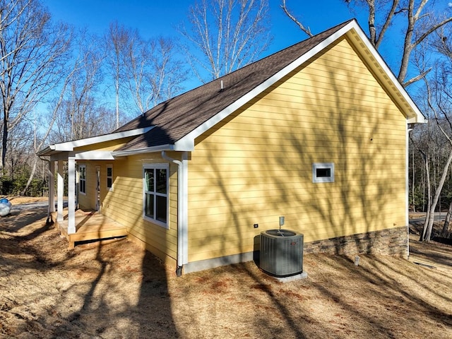 view of home's exterior featuring cooling unit