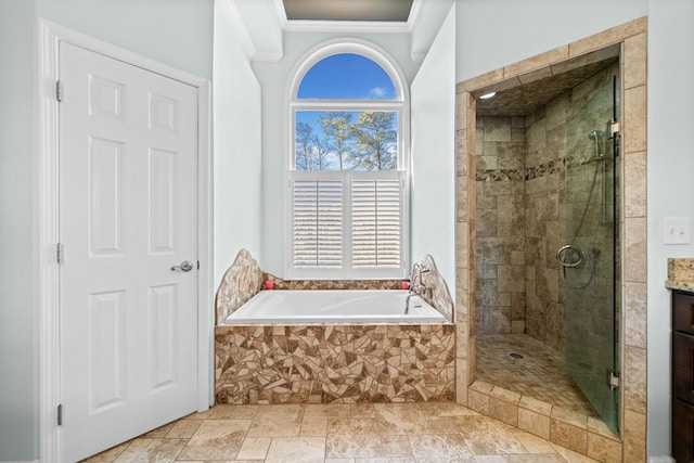 bathroom featuring a stall shower, stone tile flooring, a bath, and crown molding