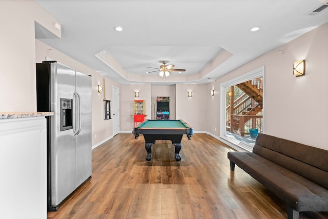 game room with a raised ceiling, visible vents, light wood-style floors, billiards, and baseboards