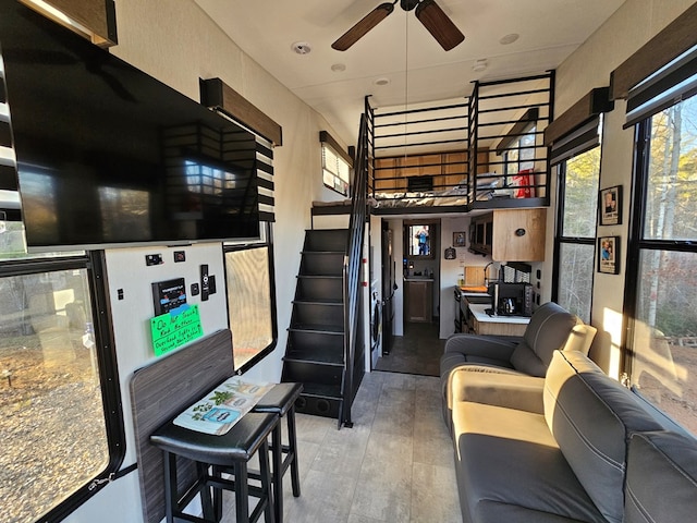 living room featuring ceiling fan