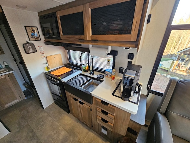 kitchen featuring black electric range