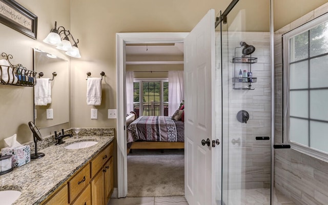 bathroom with vanity and an enclosed shower