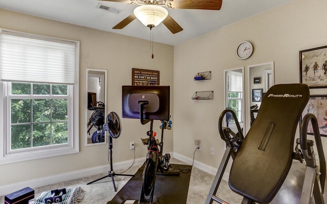 exercise area with ceiling fan