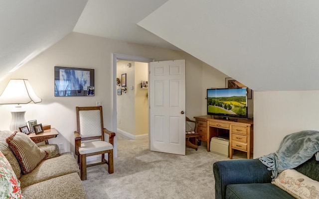 living room featuring lofted ceiling and light colored carpet