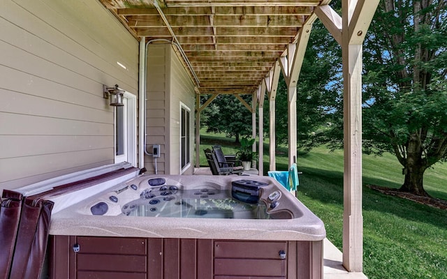 view of patio / terrace featuring a hot tub