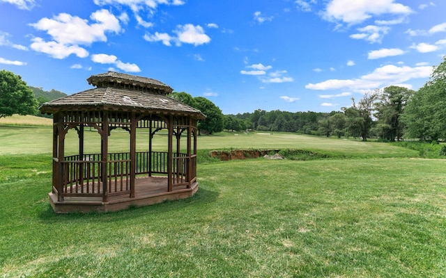 view of property's community featuring a gazebo and a lawn