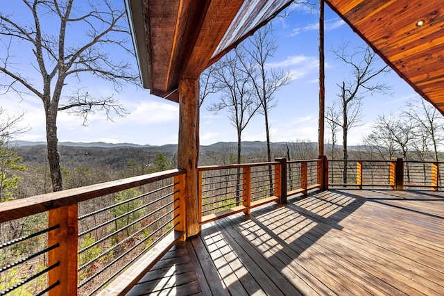 wooden terrace featuring a mountain view