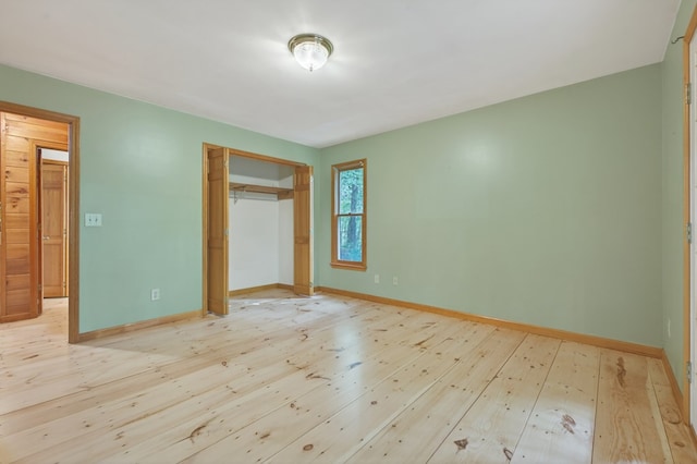776 Mountain Oak Rd, Ellijay, GA 30536 - unfurnished bedroom featuring light wood finished floors and a closet