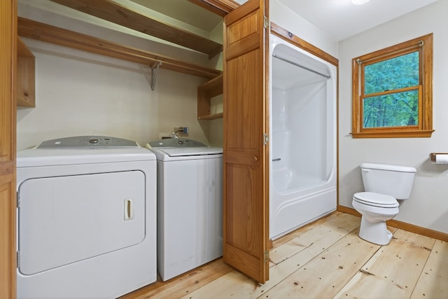 776 Mountain Oak Rd, Ellijay, GA 30536 - washroom featuring washer and clothes dryer and light wood-type flooring