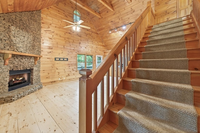 776 Mountain Oak Rd, Ellijay, GA 30536 - stairway with a wooden ceiling with exposed beams, hardwood / wood-style flooring, high vaulted ceiling, ceiling fan, and plenty of natural light