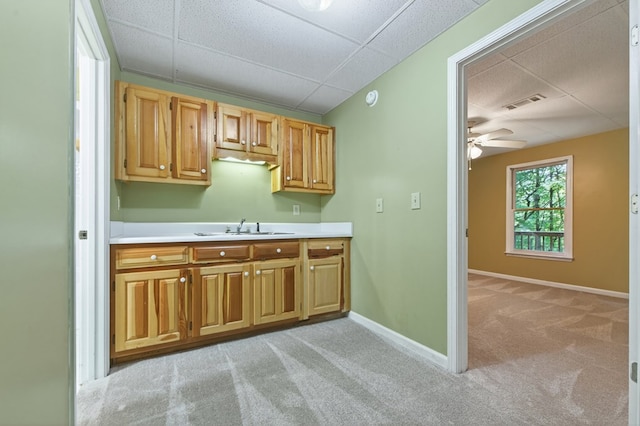 776 Mountain Oak Rd, Ellijay, GA 30536 - kitchen featuring a paneled ceiling, light colored carpet, light countertops, and ceiling fan