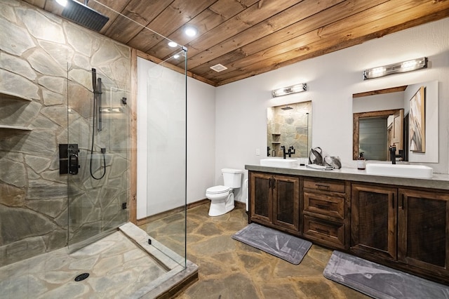 bathroom featuring vanity, toilet, an enclosed shower, and wood ceiling