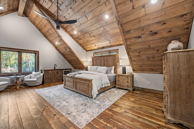 unfurnished bedroom featuring wood ceiling, ceiling fan, sink, beam ceiling, and hardwood / wood-style flooring