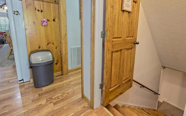 bathroom with wood-type flooring