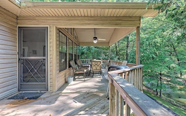 wooden deck with ceiling fan